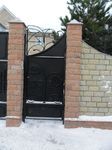 Фотография кованой калитки Кованая калитка фото