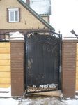 Фотография кованой калитки Кованая калитка фото