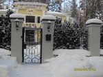 Фотография кованой калитки Кованая калитка фото