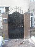 Фотография кованой калитки Кованая калитка фото