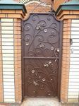 Фотография кованой калитки Кованая калитка фото