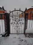 Фотография кованой калитки Кованая калитка фото