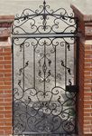 Фотография кованой калитки Кованая калитка фото