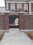 Фотография кованой калитки Кованая калитка фото