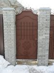Фотография кованой калитки Кованая калитка фото