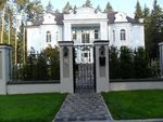 Фотография кованой калитки Кованая калитка фото