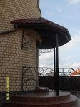 Фото кованого козырька Кованый козырек фото