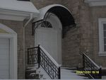 Фото кованого козырька Кованый козырек фото