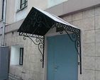 Фото кованого козырька Кованый козырек фото