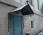 Фото кованого козырька Кованый козырек фото