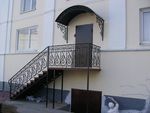 Фото кованого козырька Кованый козырек фото