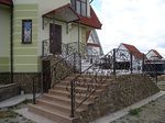 Фото кованого козырька Кованый козырек фото