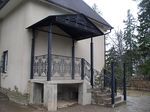 Фото кованого козырька Кованый козырек фото