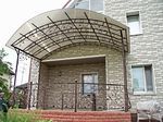 Фото кованого козырька Кованый козырек фото