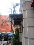 Фото кованого козырька Кованый козырек фото