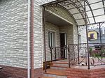 Фото кованого козырька Кованый козырек фото