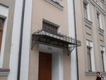 Фото кованого козырька Кованый козырек фото