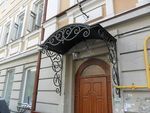 Фото кованого козырька Кованый козырек фото