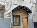 Фото кованого козырька Кованый козырек фото