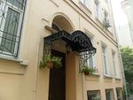Фото кованого козырька Кованый козырек фото