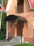 Фото кованого козырька Кованый козырек фото