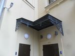 Фото кованого козырька Кованый козырек фото