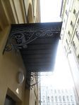 Фото кованого козырька Кованый козырек фото