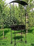 Фотография кованого мангала с крышей Мангал кованый с крышей фото
