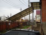Навес над крыльцом из поликарбоната фото