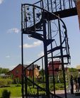 Фото винтовой кованой лестницы Винтовая кованая лестница фото